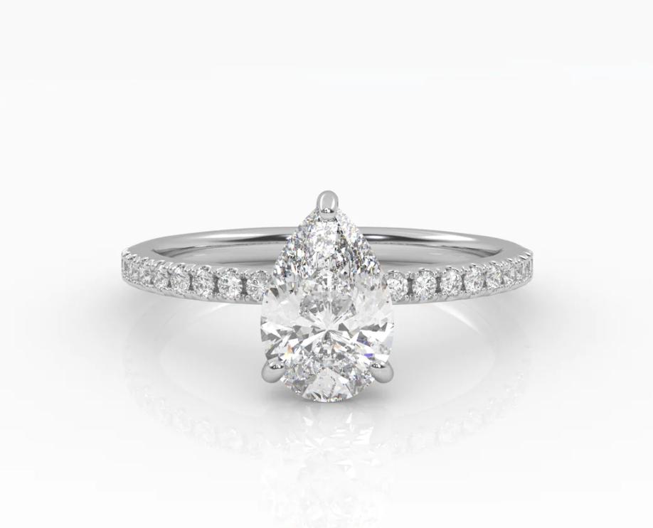 Pear Solitaire with Pave Band Ring