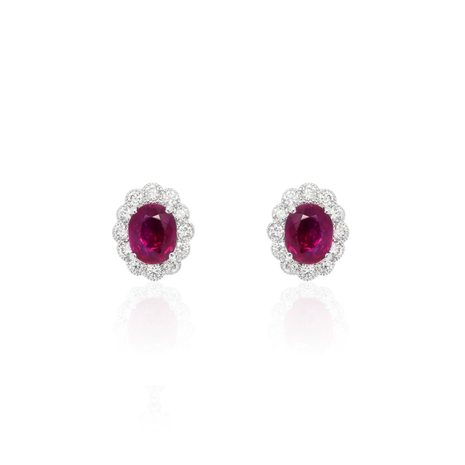 3ct Oval Ruby with Halo studs